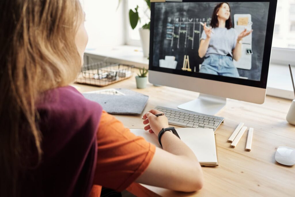 pexels-photo-4144222 Photo of Girl Watching Through Imac